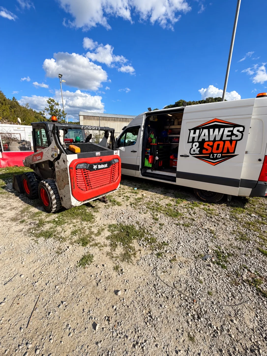 Hawes & Son mobile service van alongside Bobcat machinery on site